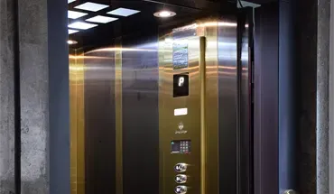 کابین آسانسور دودی طلایی